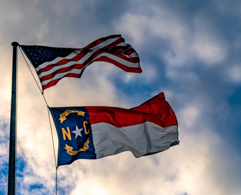 This,Is,The,America,And,North,Carolina,Flag,Flying,Beautifully
