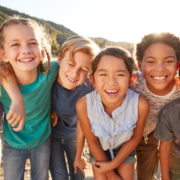Portrait,Of,Multi-cultural,Children,Hanging,Out,With,Friends,In,The
