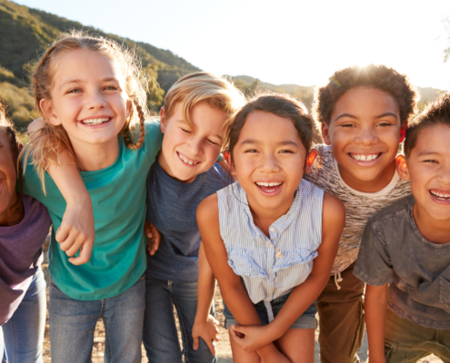 Portrait,Of,Multi-cultural,Children,Hanging,Out,With,Friends,In,The