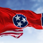 The,Tennessee,State,Flag,Waving,Along,With,The,National,Flag