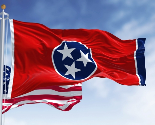 The,Tennessee,State,Flag,Waving,Along,With,The,National,Flag