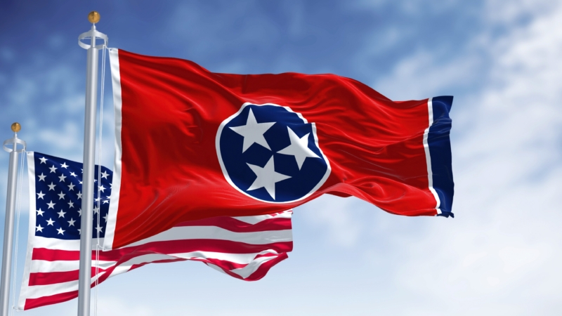 The,Tennessee,State,Flag,Waving,Along,With,The,National,Flag