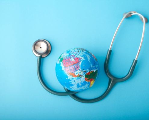 World,Health,Day,,stethoscope,Wrapped,Around,Globe,On,Pastel,Blue
