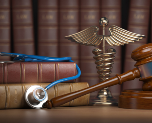 Gavel,,Stethoscope,And,Caduceus,Sign,On,Books,Background.,Mediicine,Laws