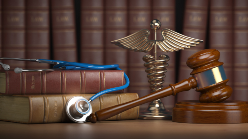 Gavel,,Stethoscope,And,Caduceus,Sign,On,Books,Background.,Mediicine,Laws