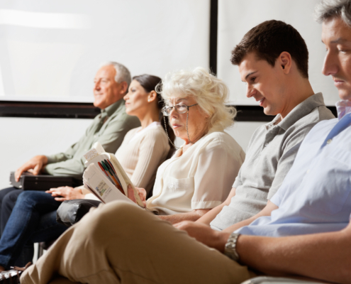 Row,Of,Multiethnic,People,Waiting,For,The,Doctor,In,Hospital
