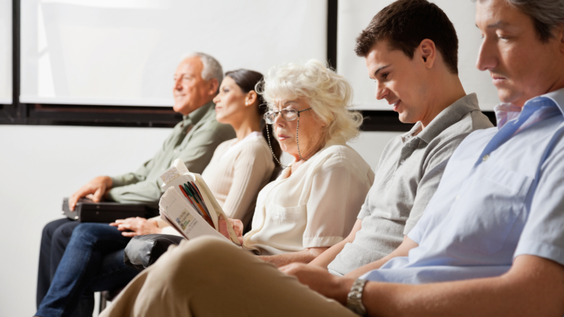 Row,Of,Multiethnic,People,Waiting,For,The,Doctor,In,Hospital