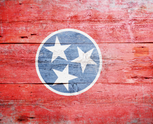 Flag,Of,Tennessee,Painted,On,Grungy,Wooden,Background