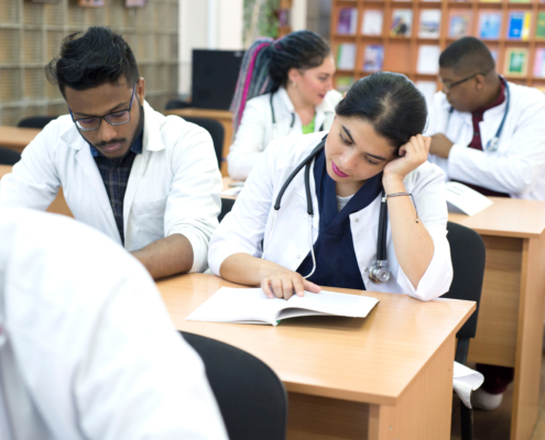 A,Group,Of,Young,Multiethnic,Races,,Medical,Students.,Read,Textbooks
