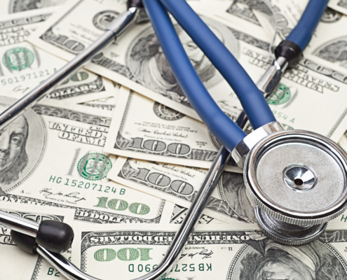 Heap,Of,Dollars,With,Stethoscope