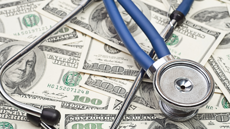 Heap,Of,Dollars,With,Stethoscope
