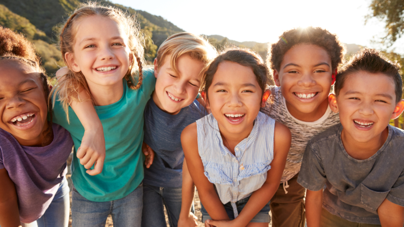 Portrait,Of,Multi-cultural,Children,Hanging,Out,With,Friends,In,The