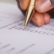Close-up,Of,Businessman,Filling,Customer,Survey,Form