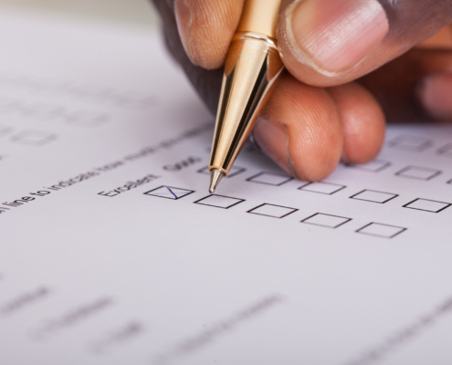 Close-up,Of,Businessman,Filling,Customer,Survey,Form
