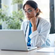 Shot,Of,Serious,Female,Doctor,Working,With,Her,Laptop,In
