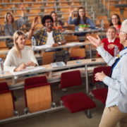 Female,Elderly,Professor,Answering,Student’s,Questions,In,Amphitheater