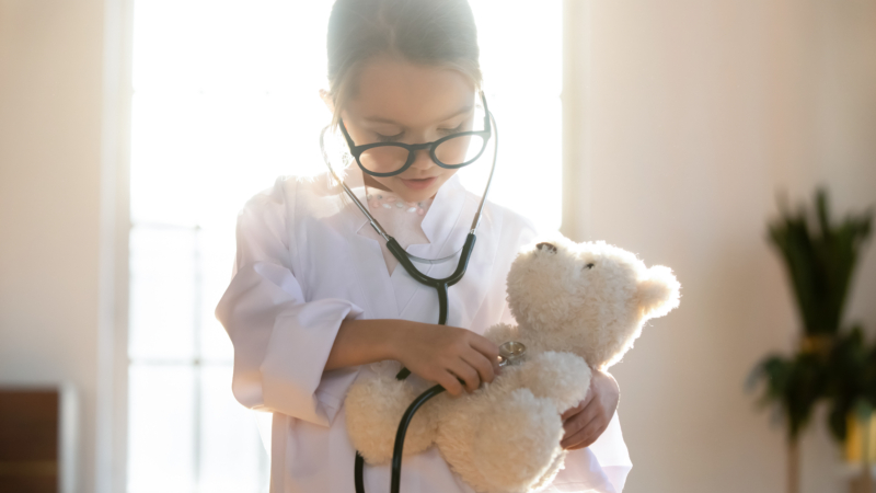 Close,Up,Pretty,Little,Girl,Playing,Doctor,,Using,Stethoscope,,Holding