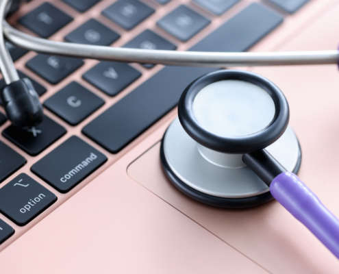 Stethoscope,On,Laptop,Keyboard.,Medical,Continuing,Education,Courses,Concept