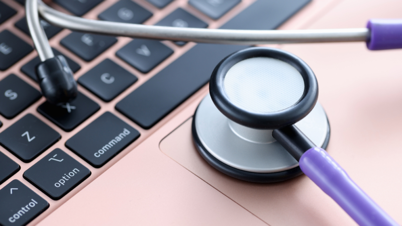 Stethoscope,On,Laptop,Keyboard.,Medical,Continuing,Education,Courses,Concept