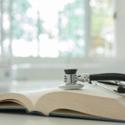 Stethoscope,On,Medical,Guide,Book,For,Doctor,Learning,Treatment,At