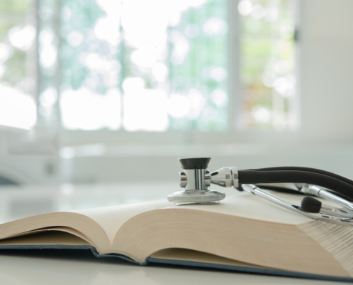 Stethoscope,On,Medical,Guide,Book,For,Doctor,Learning,Treatment,At