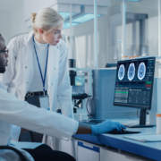 Modern,Medical,Research,Laboratory:,Two,Scientists,Use,Computer,With,Screen