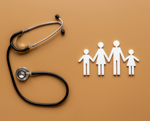 Medical,Care,Concept.,Family,Figure,With,Stethoscope,,Top,View