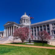 Missouri,State,Capitol,With,Pink,Magnolia,Tree,Flowers,In,Spring
