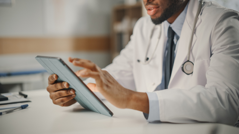 Close,Up,Of,African,American,Male,Doctor,Wearing,White,Coat