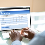 African,Man,Filling,Survey,Poll,Or,Form,On,Laptop,Computer