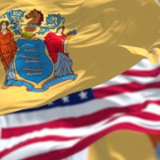 The,New,Jersey,State,Flag,Waving,Along,With,The,National