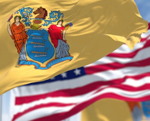 The,New,Jersey,State,Flag,Waving,Along,With,The,National