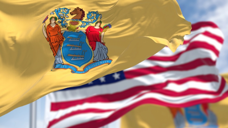 The,New,Jersey,State,Flag,Waving,Along,With,The,National