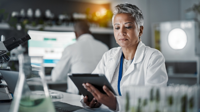 Senior,Scientist,Woman,,Tablet,And,Lab,Research,At,Desk,With