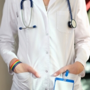 Cropped,Image,Of,Nurse,With,Rainbow,Bracelet,On,Her,Hand.