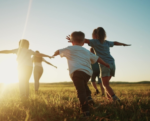 Kids,Run,In,The,Park,At,Sunset.,Friendly,Family,Children