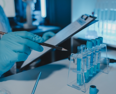 A,Scientist,Is,Working,In,Laboratory,And,Taking,Note,Of