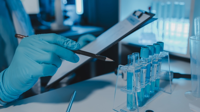 A,Scientist,Is,Working,In,Laboratory,And,Taking,Note,Of