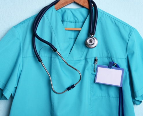 Teal,Medical,Scrub,With,Stethoscope,And,Blank,Name,Tag
