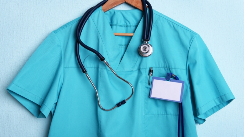 Teal,Medical,Scrub,With,Stethoscope,And,Blank,Name,Tag