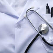 Close-up,Of,White,Doctor,Coat,With,Stethoscope,And,Pens,In