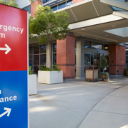 Main,Entrance,Of,Modern,Hospital,Building,With,Signs