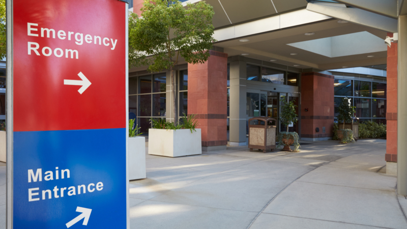 Main,Entrance,Of,Modern,Hospital,Building,With,Signs