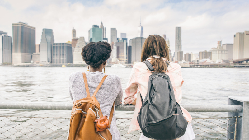 Two,Women,Looking,At,New,York,Skyline,-,Multiethnic,Girls