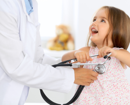 Doctor,Examining,A,Little,Girl,By,Stethoscope