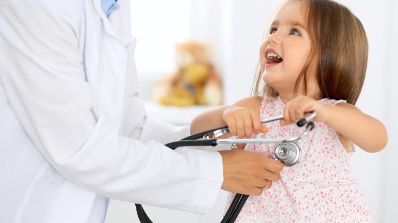 Doctor,Examining,A,Little,Girl,By,Stethoscope
