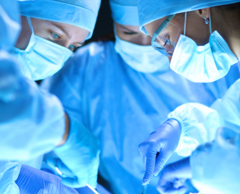 Team,Surgeon,At,Work,On,Operating,In,Hospital