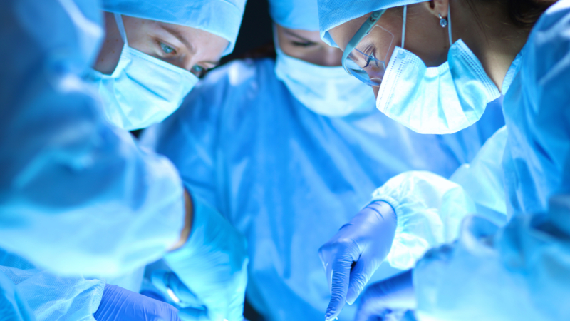 Team,Surgeon,At,Work,On,Operating,In,Hospital