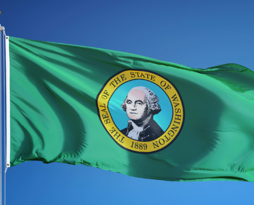 Washington,(u.s.,State),Flag,Waving,Against,Clear,Blue,Sky,,Close