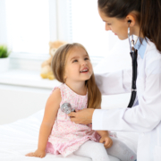 Doctor,Examining,A,Little,Girl,By,Stethoscope